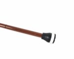 Brown billiard pool cue lying diagonally on a white background with a black grip and white tip in view.