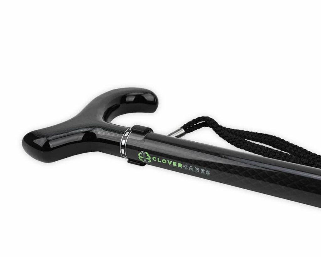Ergonomic black J-shaped walking cane with wrist strap and CloverCanes branding