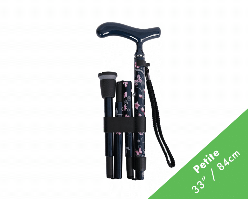 Foldable walking cane with a curved blue handle and floral-patterned shafts, held together by a black strap; label reads Petite 3' / 84 cm in the corner