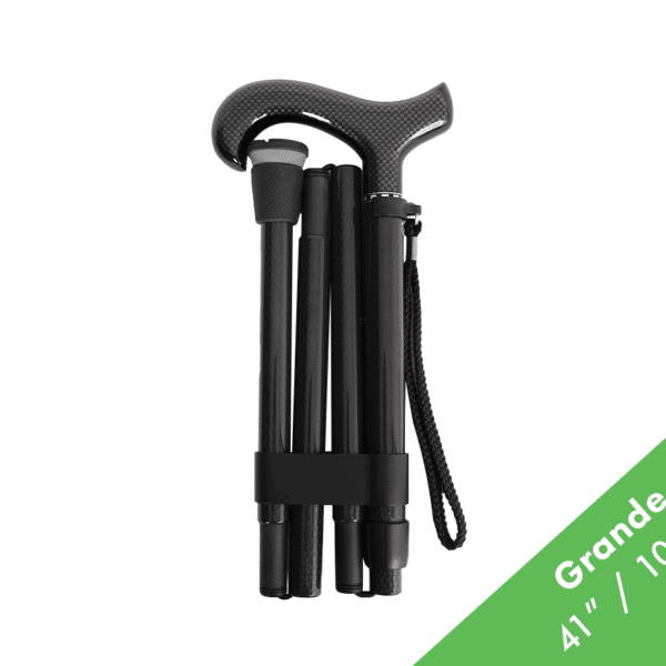 Foldable black trekking poles with carbon-fiber handle, bundled together with a strap, showing their collapsed length and a green corner label reading Grande 41" / 104 cm