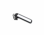 Handheld tool with a long white rectangular pad and a black frame, mounted on a small metal clamp at the base.