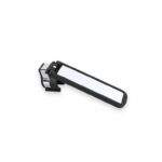Handheld tool with a long white rectangular pad and a black frame, mounted on a small metal clamp at the base.