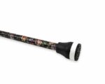 Floral-patterned baton or walking-stick portion with black grip and white ring at the end; decorative handheld rod shown diagonally on white background.