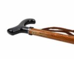 Wooden walking cane with a glossy black curved handle and a brown braided strap, Clover Canes logo visible on shaft.